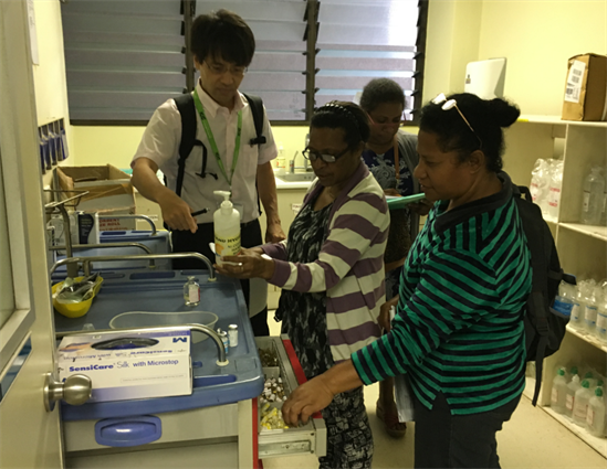 An expert from DCC ning the visit to Port Moresby General Hospital, July 2018